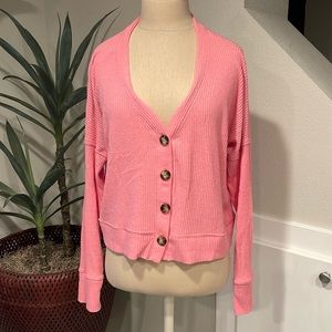 Pink Abercrombie cardigan hits at the natural waste